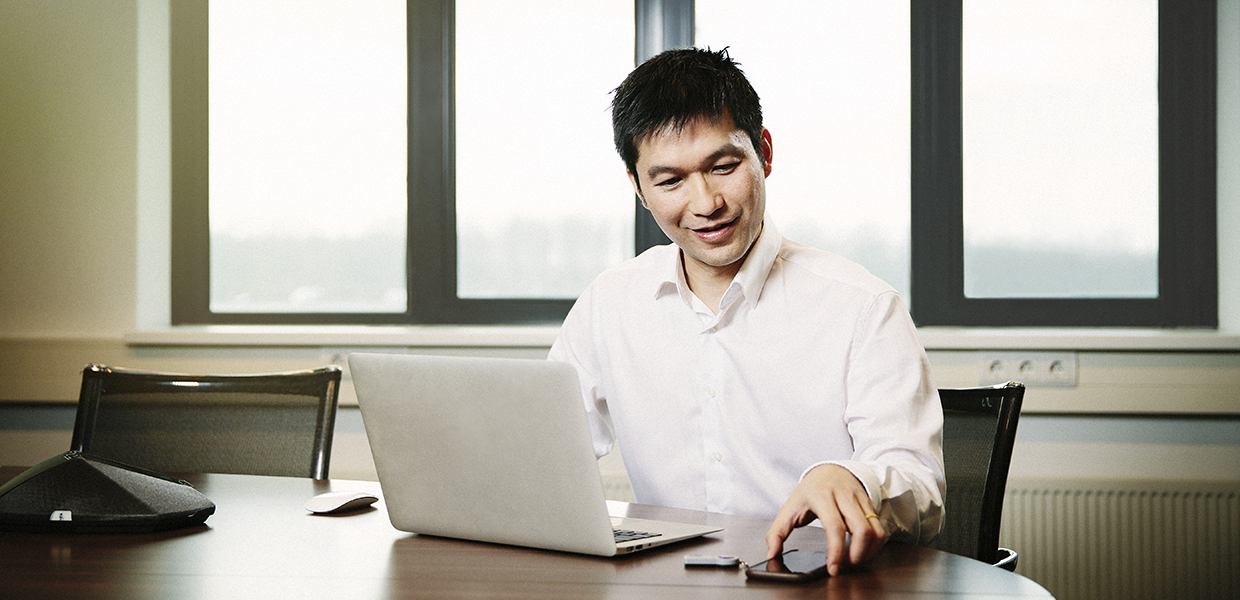 Man using devices in office